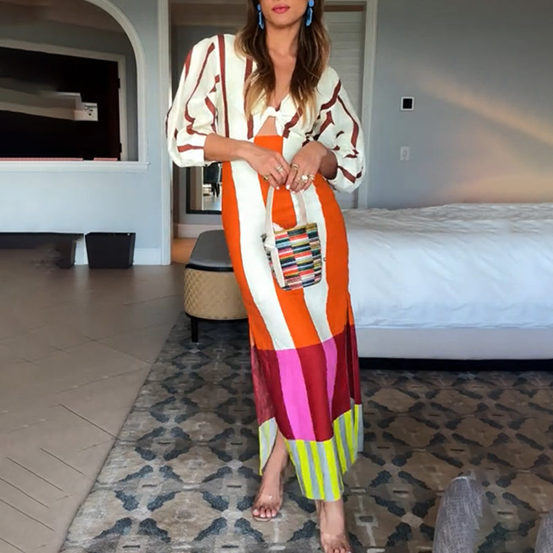 Kaya lina maisījuma krāsu bloku apdrukas kleita priekšpusē ar izgriezumu, mezglu ar pufām piedurknēm