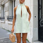 Date Night Front Cutout Pocketed Halter H-line Mini Dress